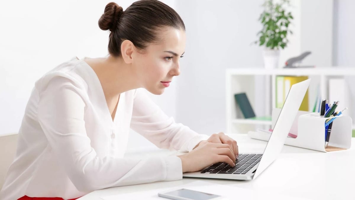 Bad sitting posture at desk worker