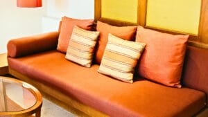 Your Throw Pillows Are Making Your Sofa Look Cheap—Here's the Right Way to Style Them